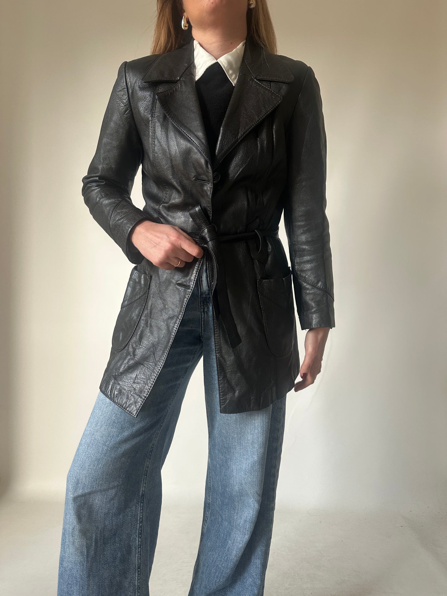 Black leather jacket with belt