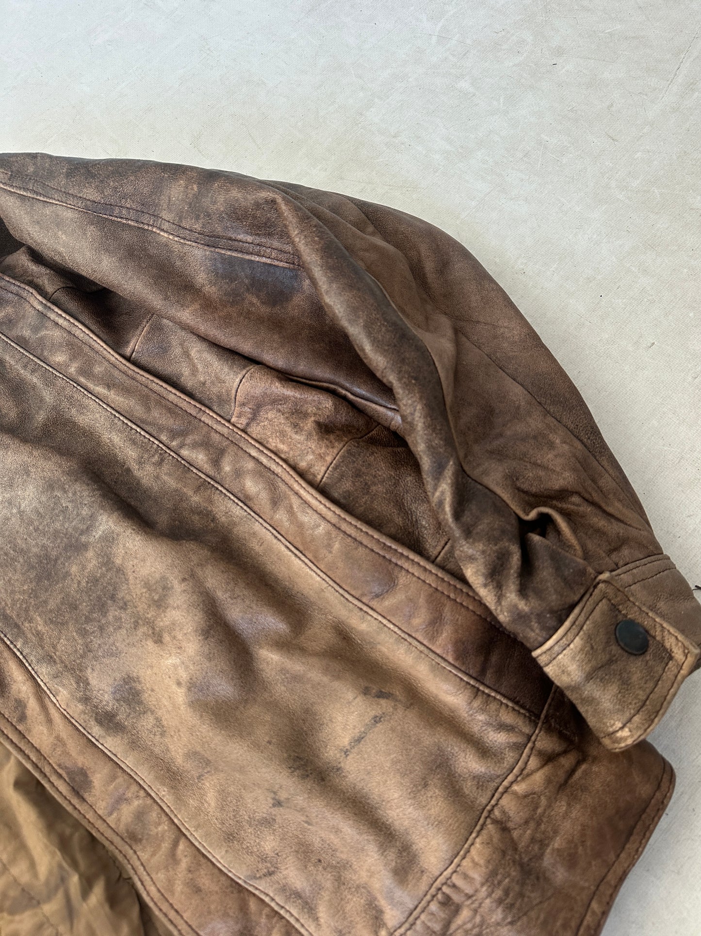 Unique brown distressed bomber