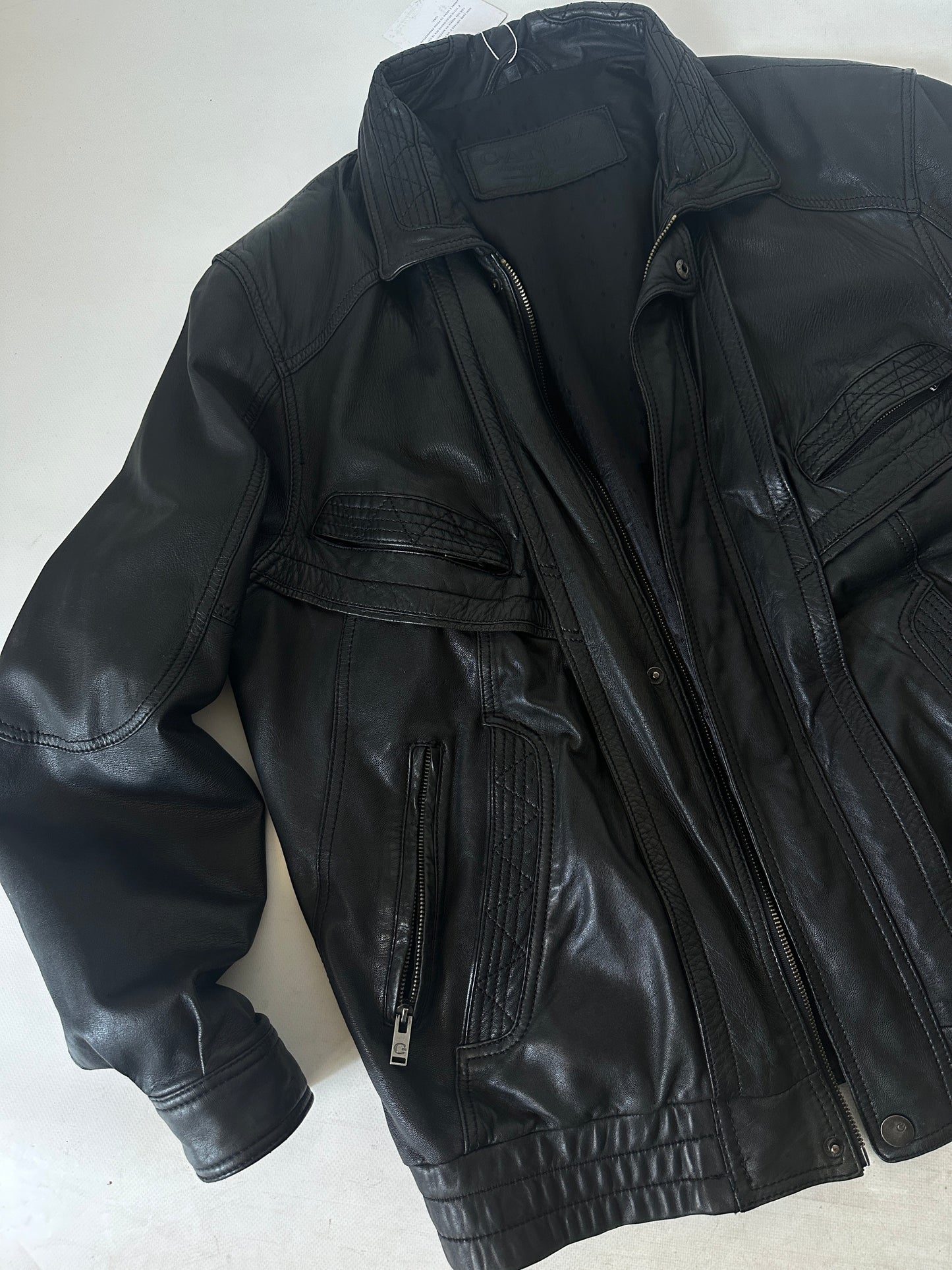 Genderless black leather bomber