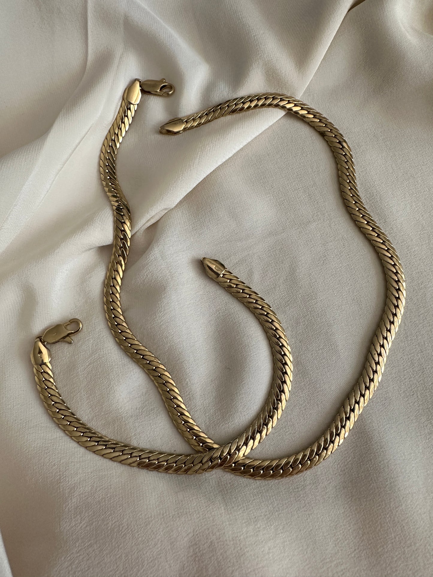 Parure girocollo e bracciale snake placcato oro