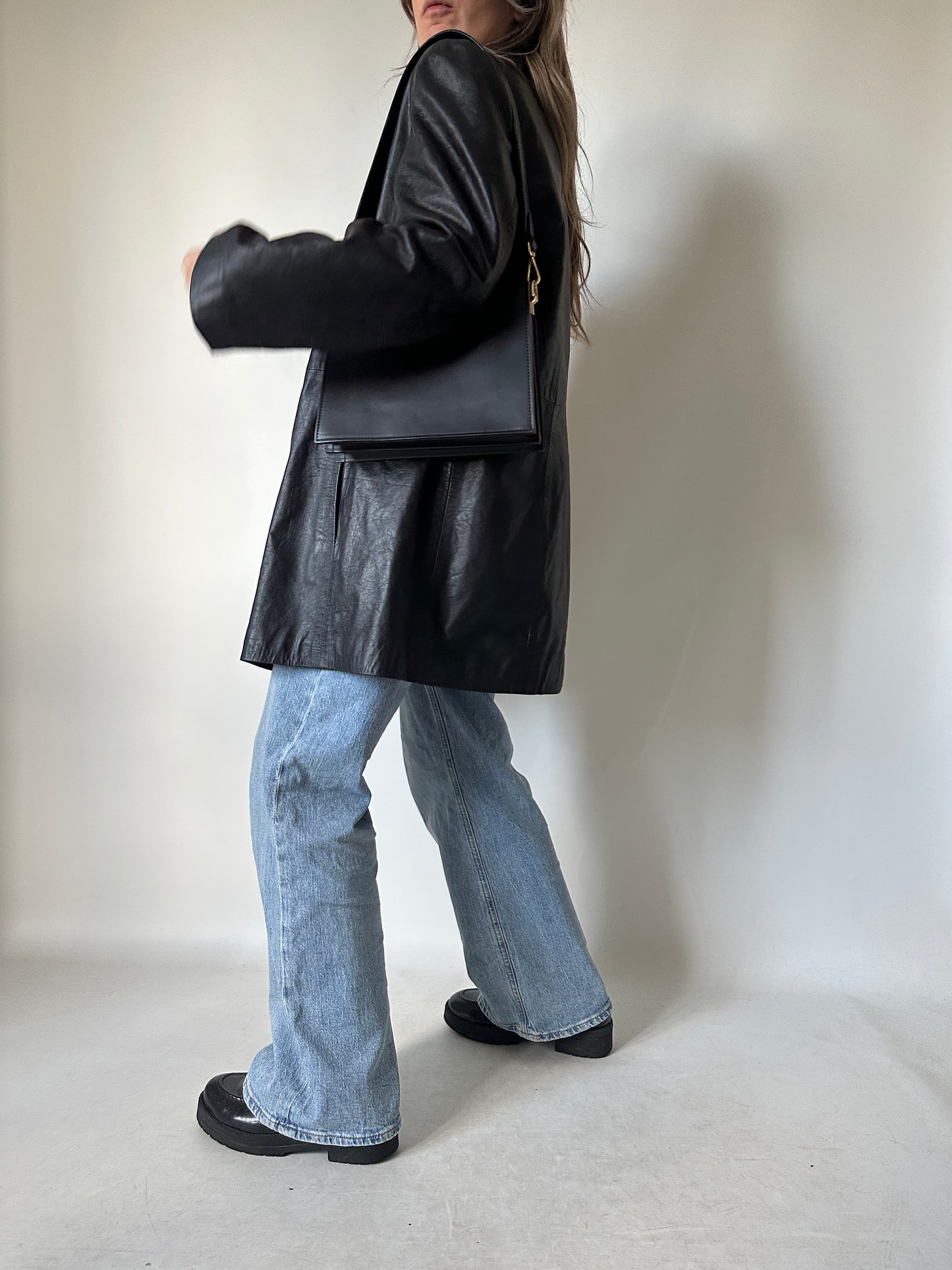 Minimal black leather jacket