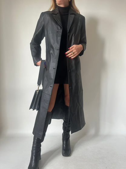 Iconic extra long black leather trench