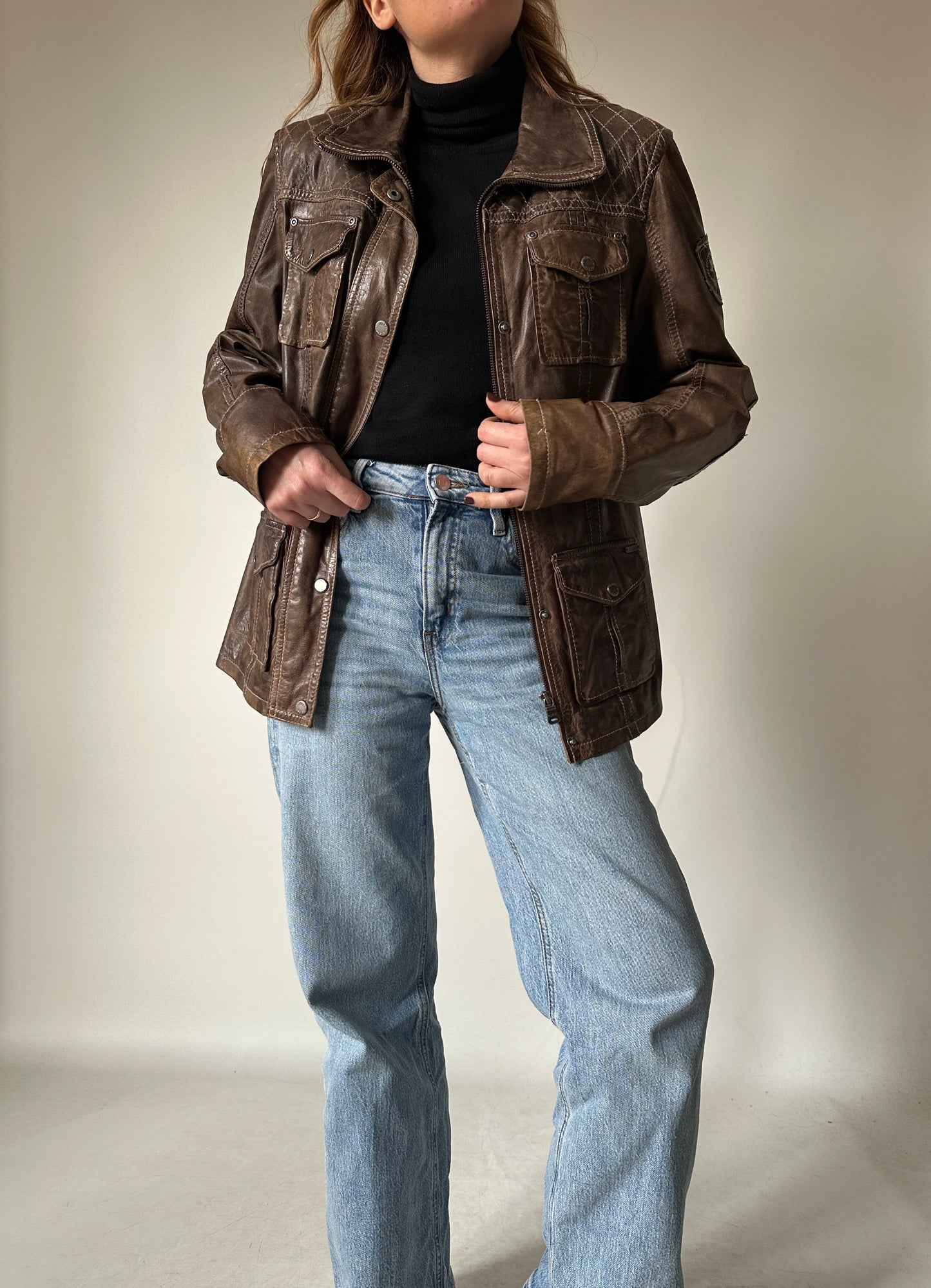 Distressed brown leather jacket