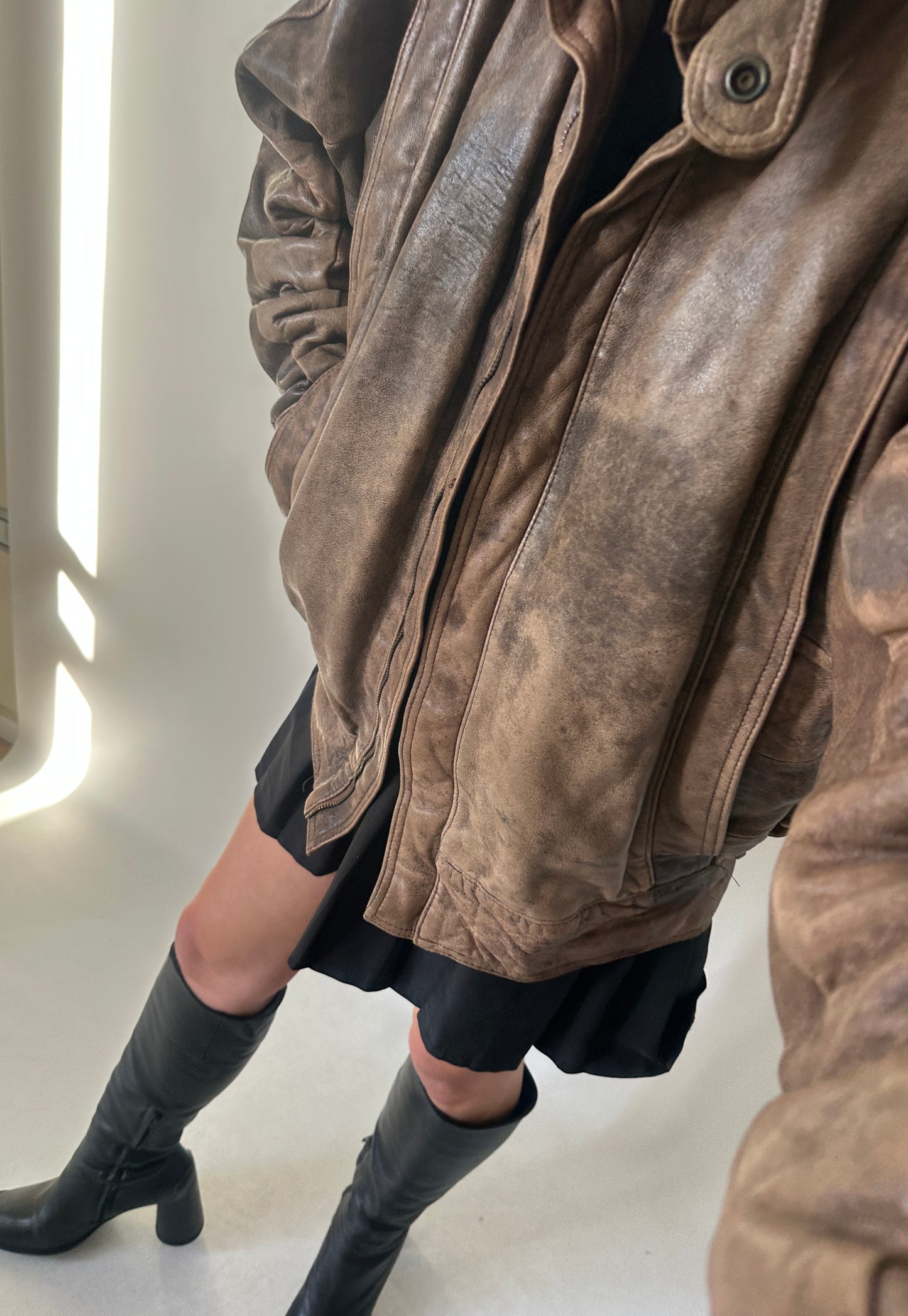 Unique brown distressed bomber