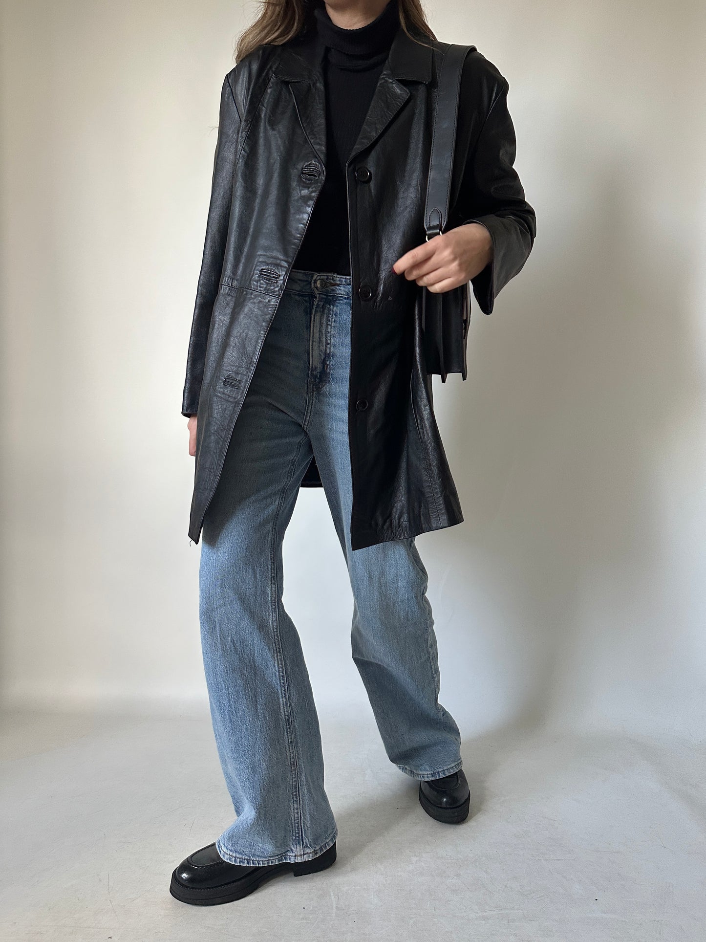 Minimal black leather jacket