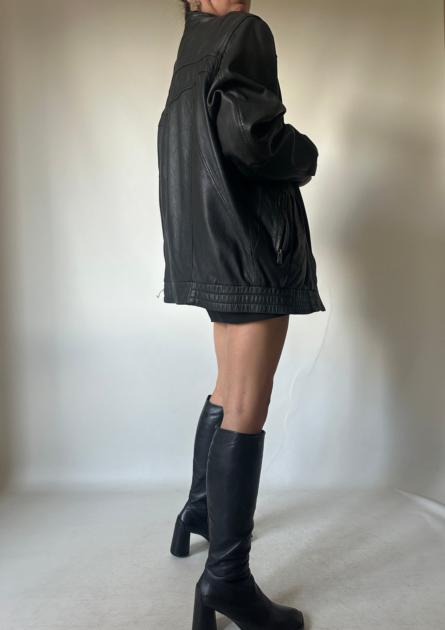 Genderless black leather bomber