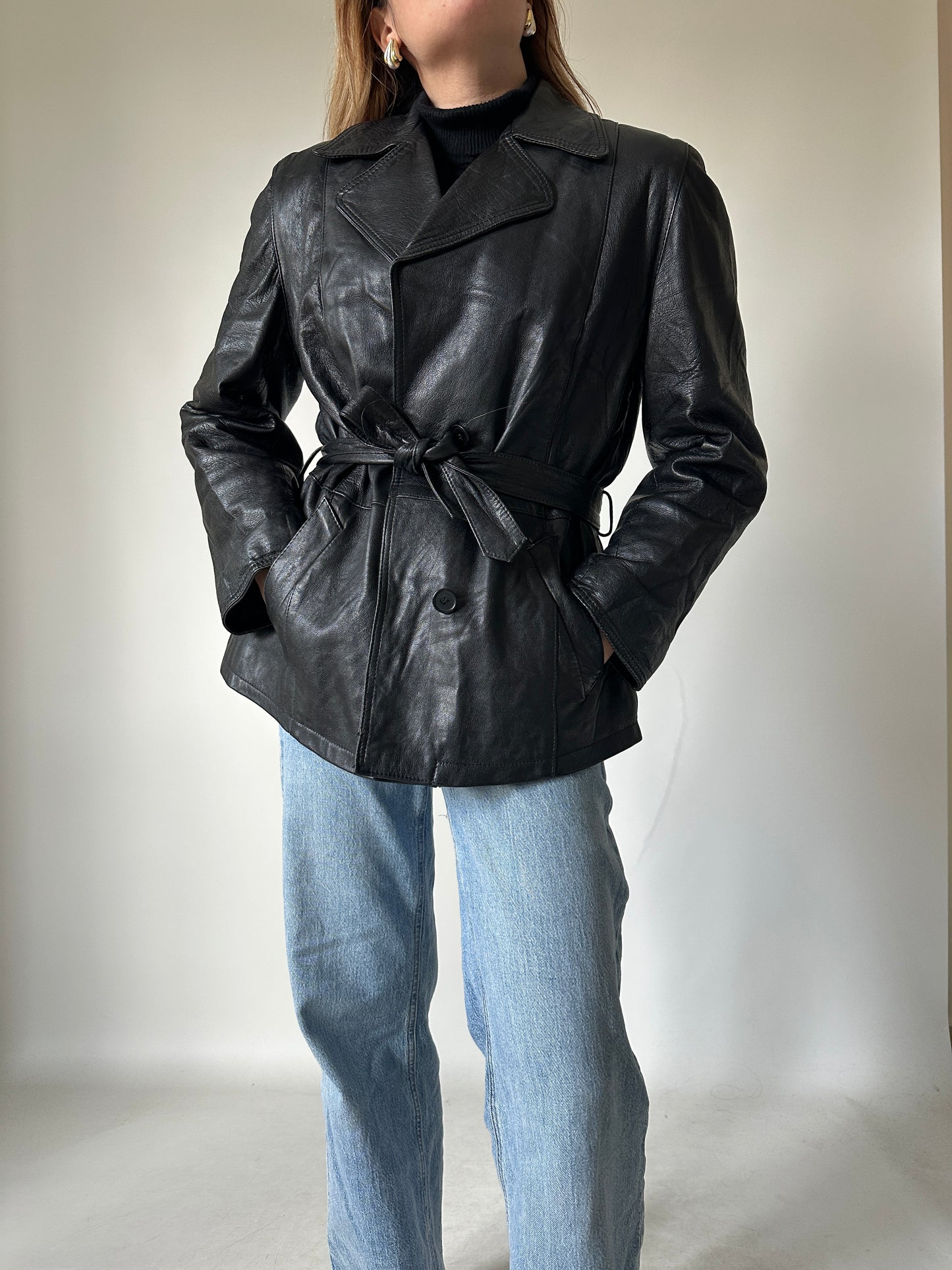 Chic leather jacket with belt