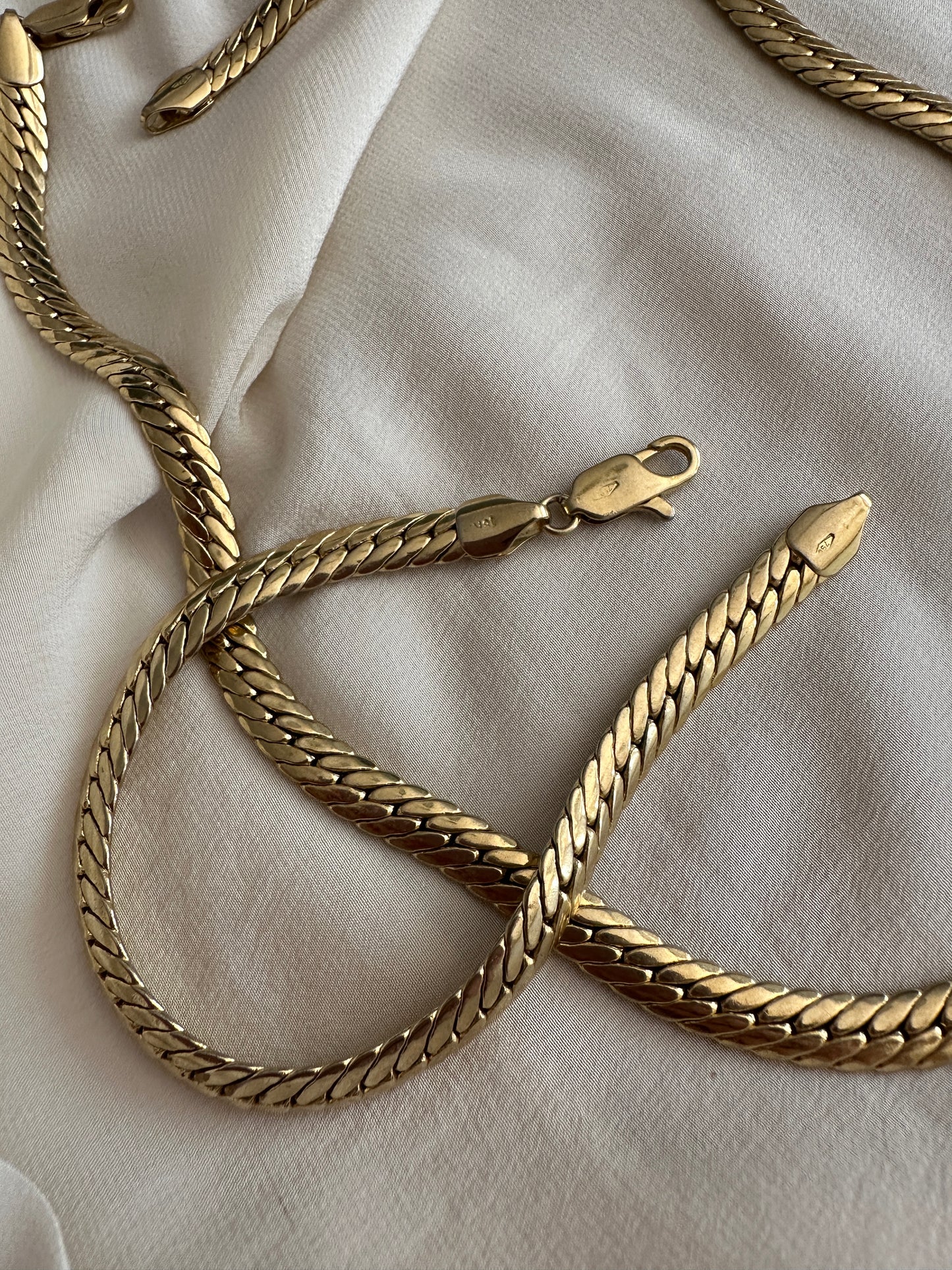 Parure girocollo e bracciale snake placcato oro