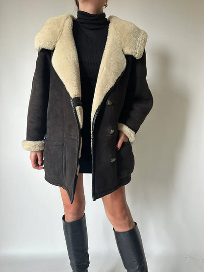Shearling nero con cappuccio