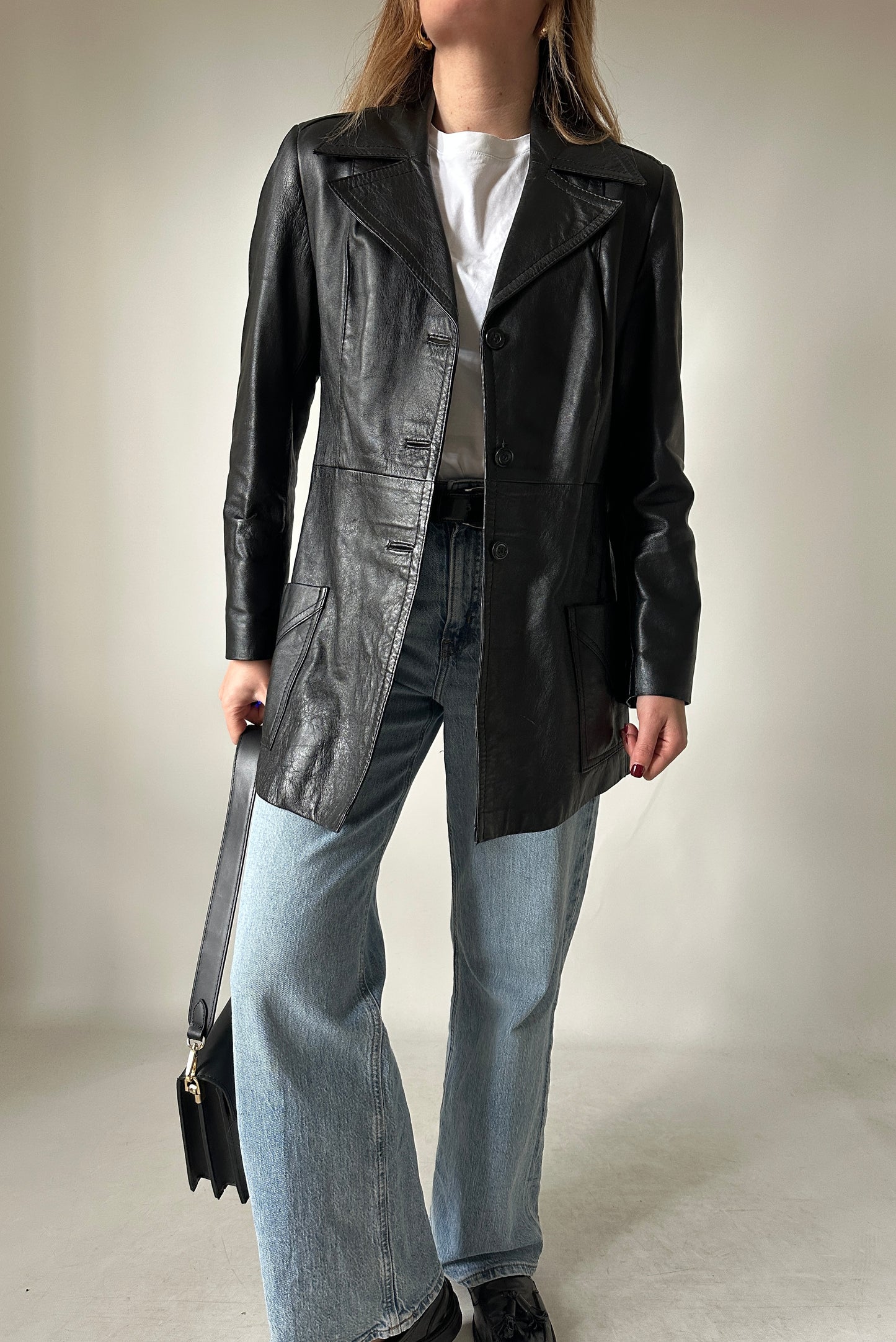 Minimal black leather jacket