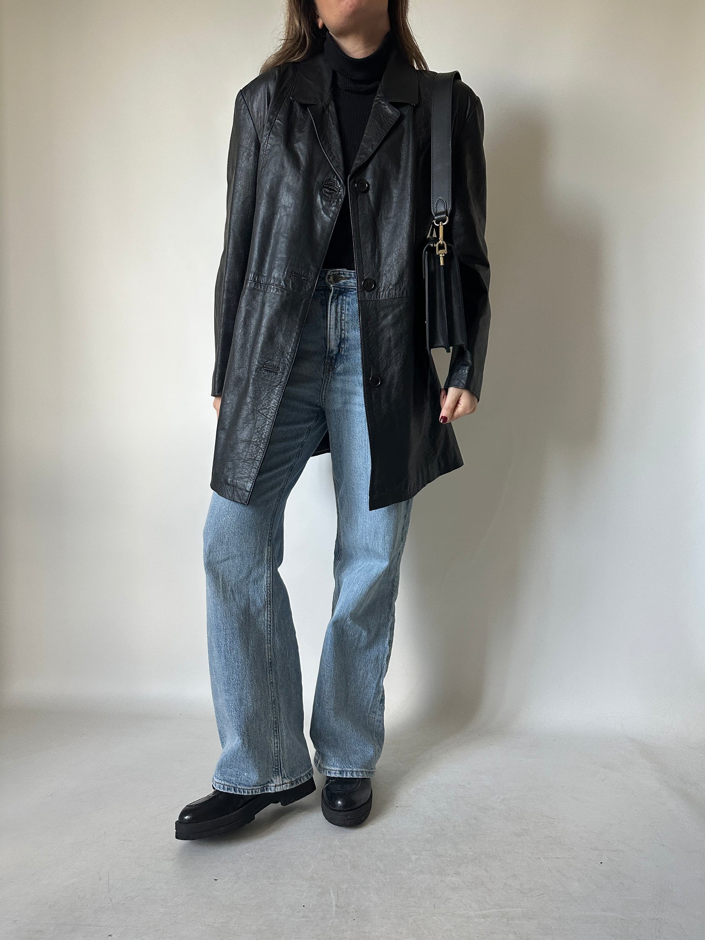 Minimal black leather jacket