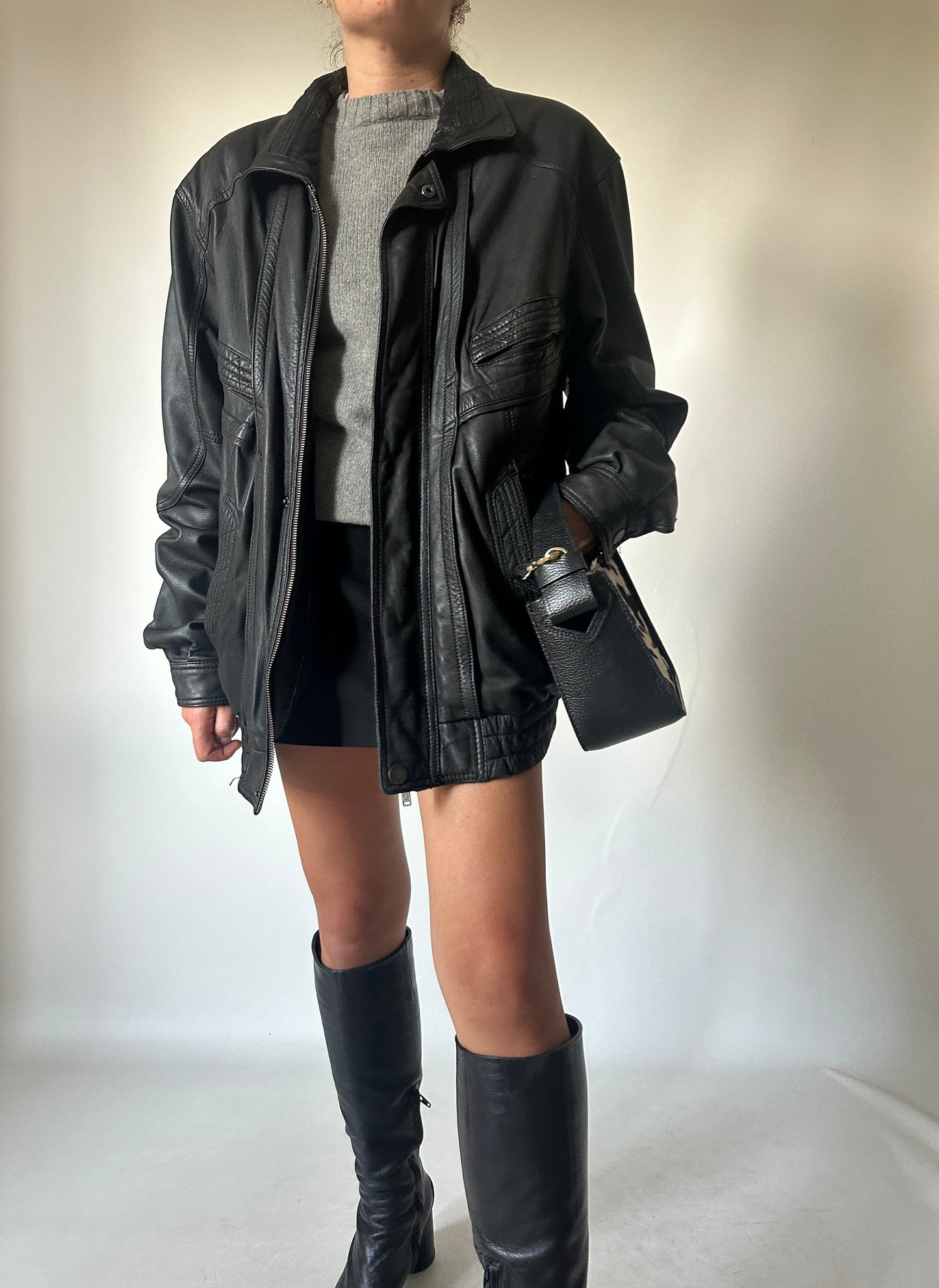 Genderless black leather bomber