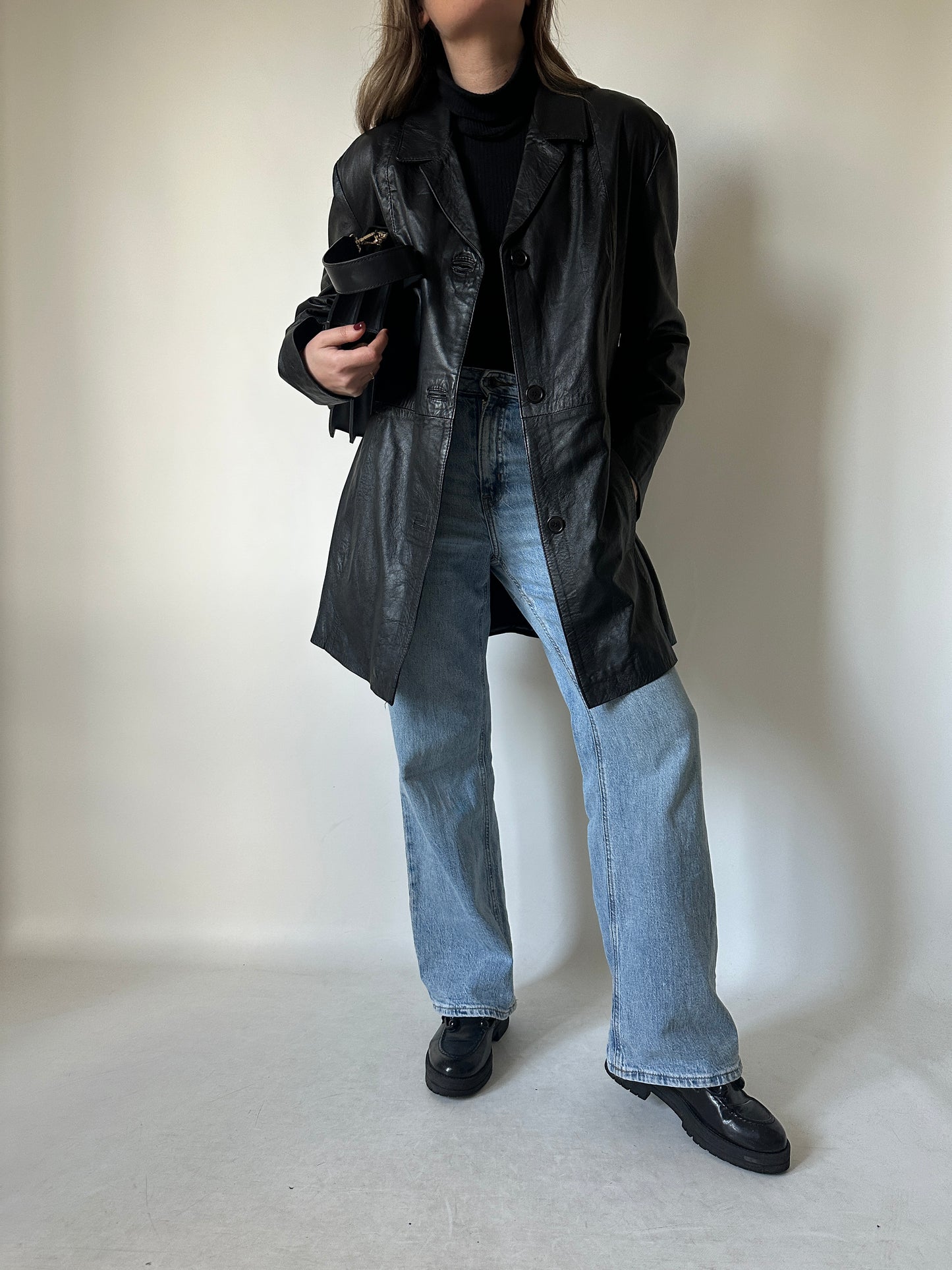 Minimal black leather jacket