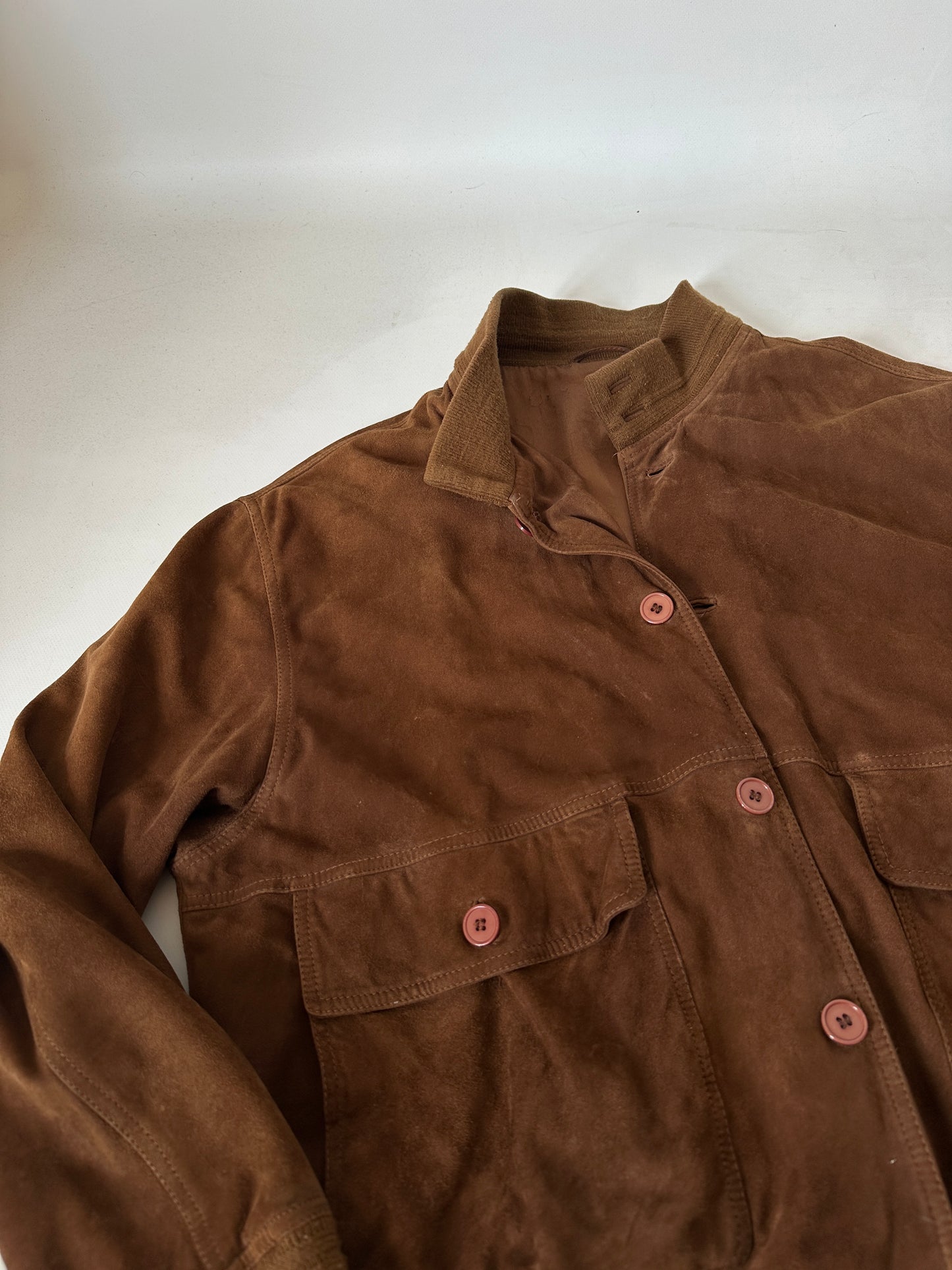 iconic brown suede bomber