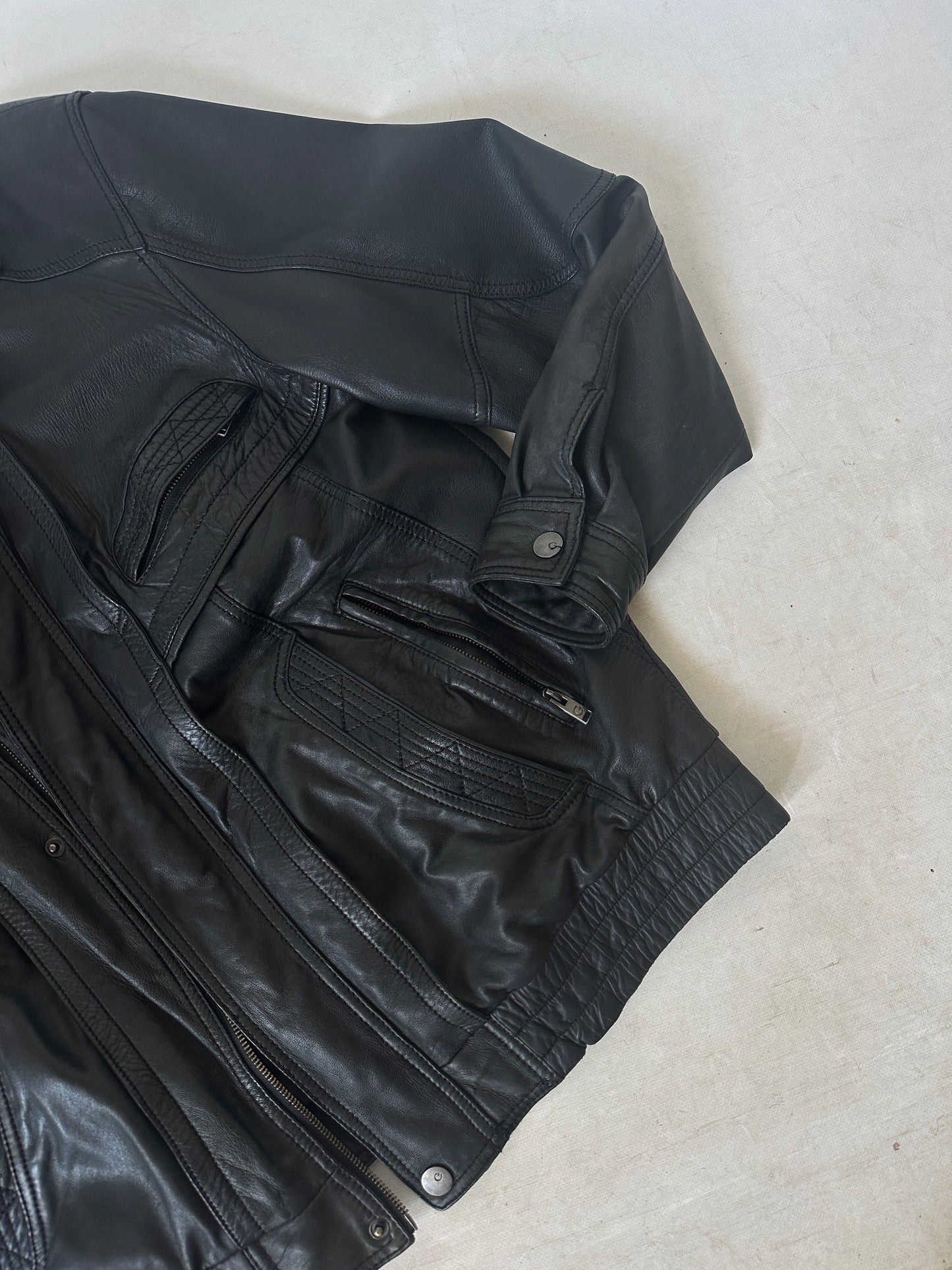 Genderless black leather bomber