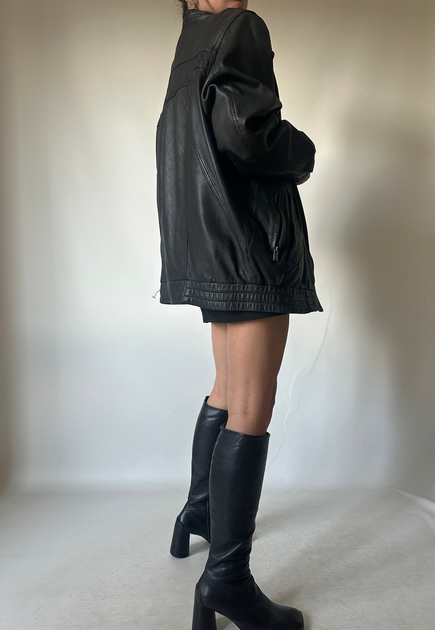 Genderless black leather bomber