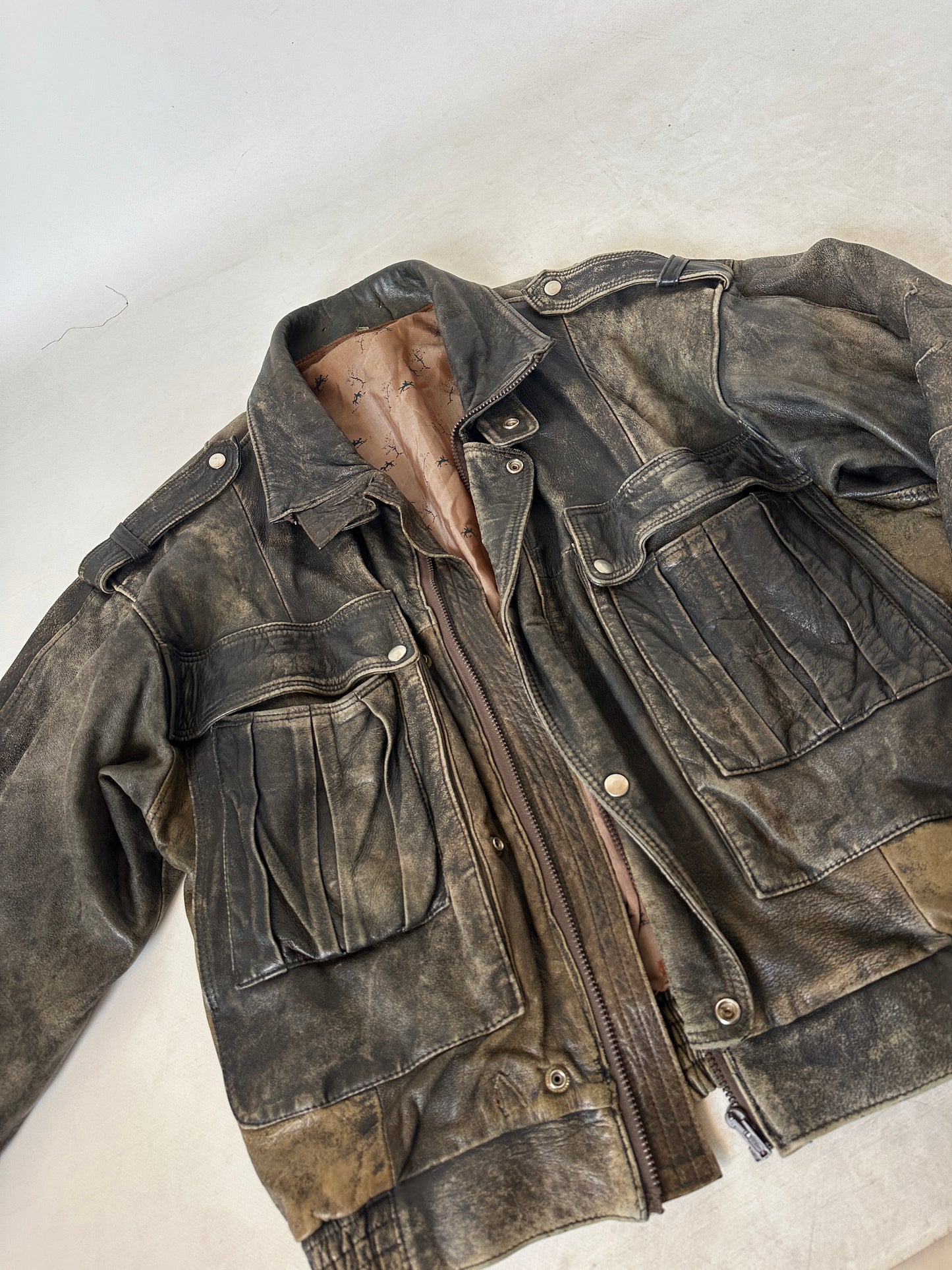 Unique distressed leather bomber