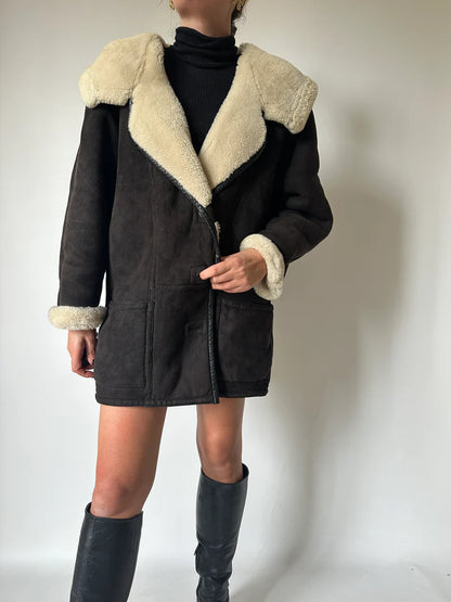 Shearling nero con cappuccio