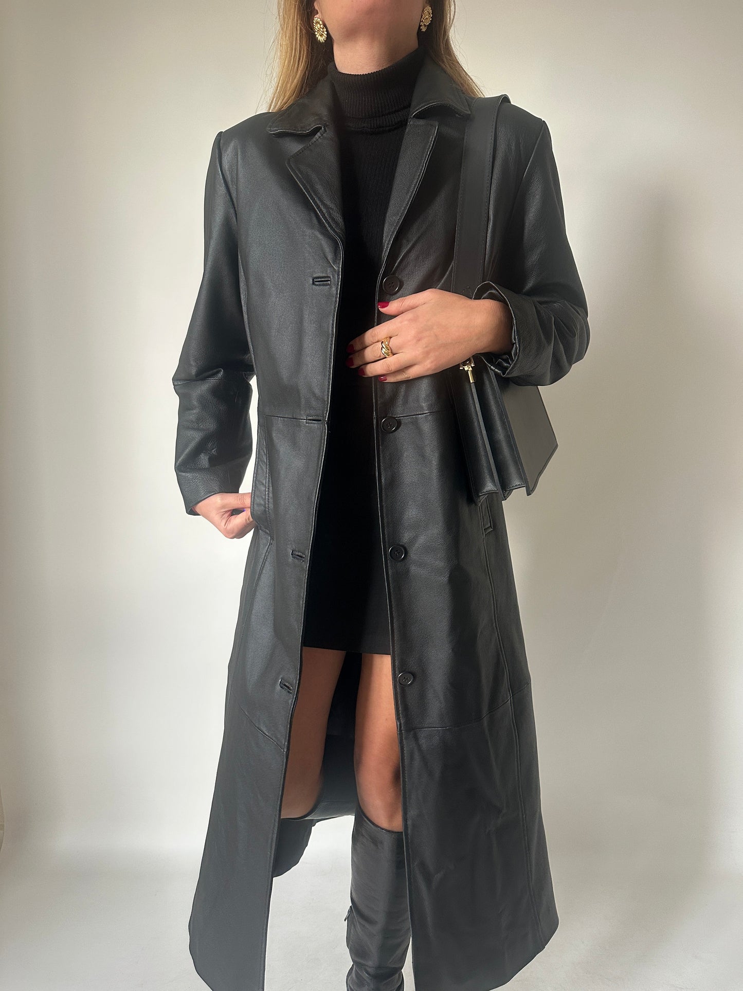 Iconic extra long black leather trench