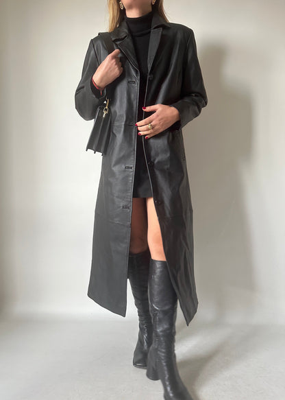 Iconic extra long black leather trench