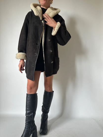 Shearling nero con cappuccio