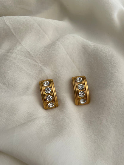 Orecchini mezzo cerchio con brillanti