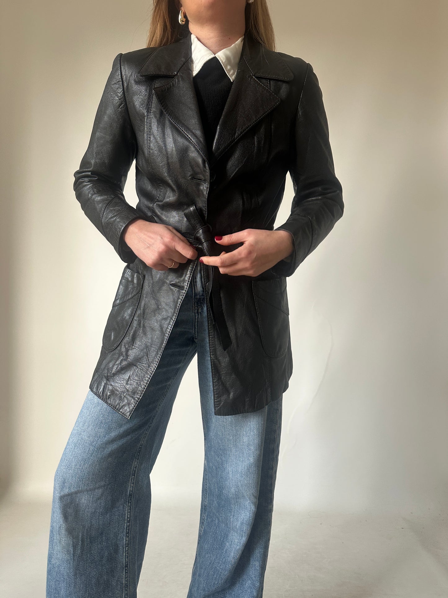 Black leather jacket with belt