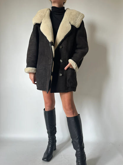 Shearling nero con cappuccio