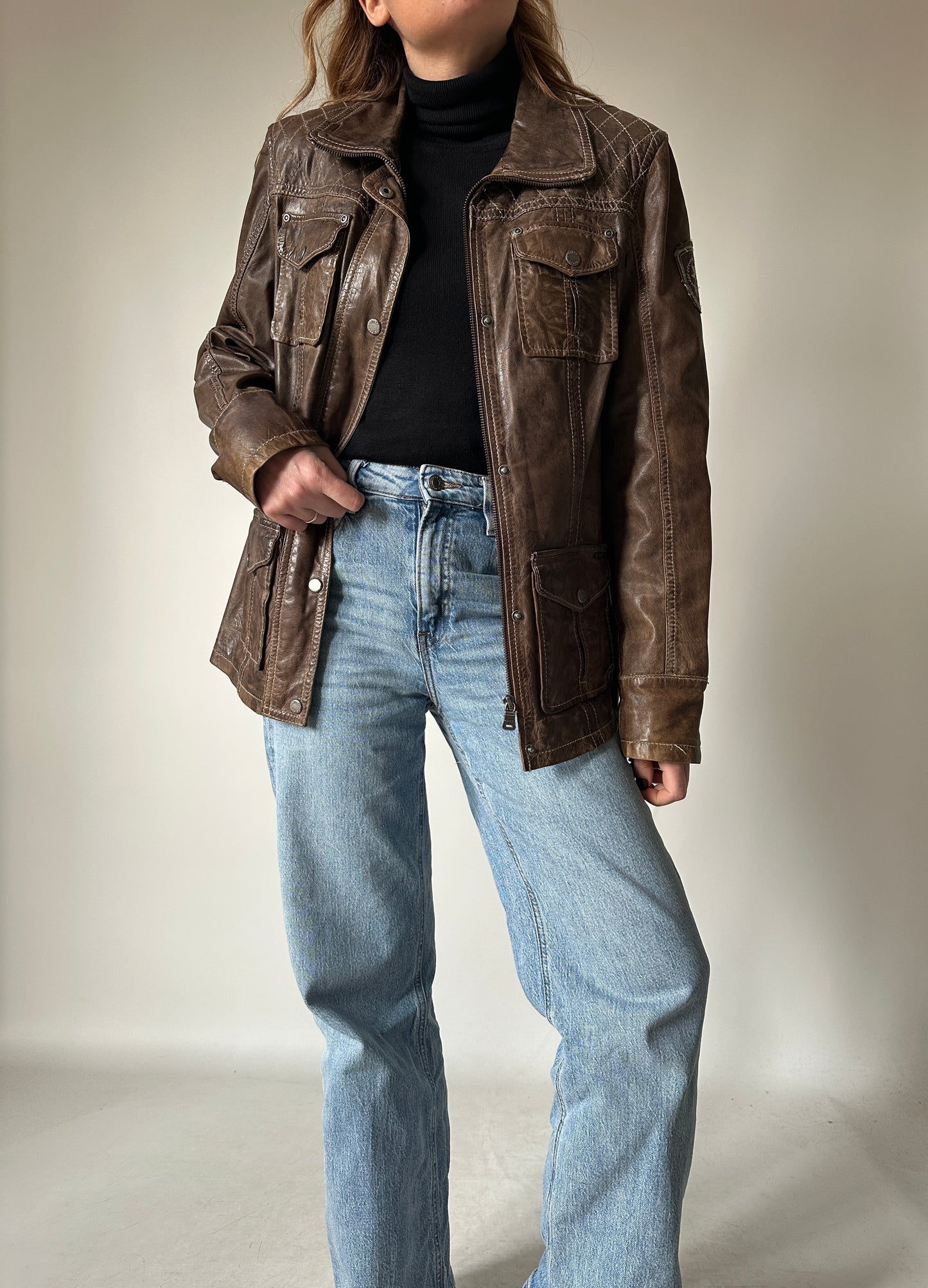 Distressed brown leather jacket