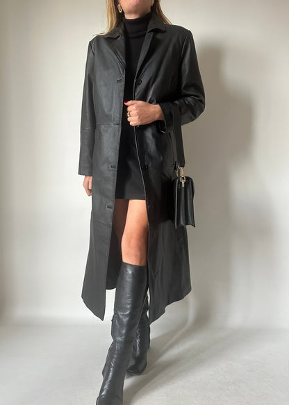 Iconic extra long black leather trench