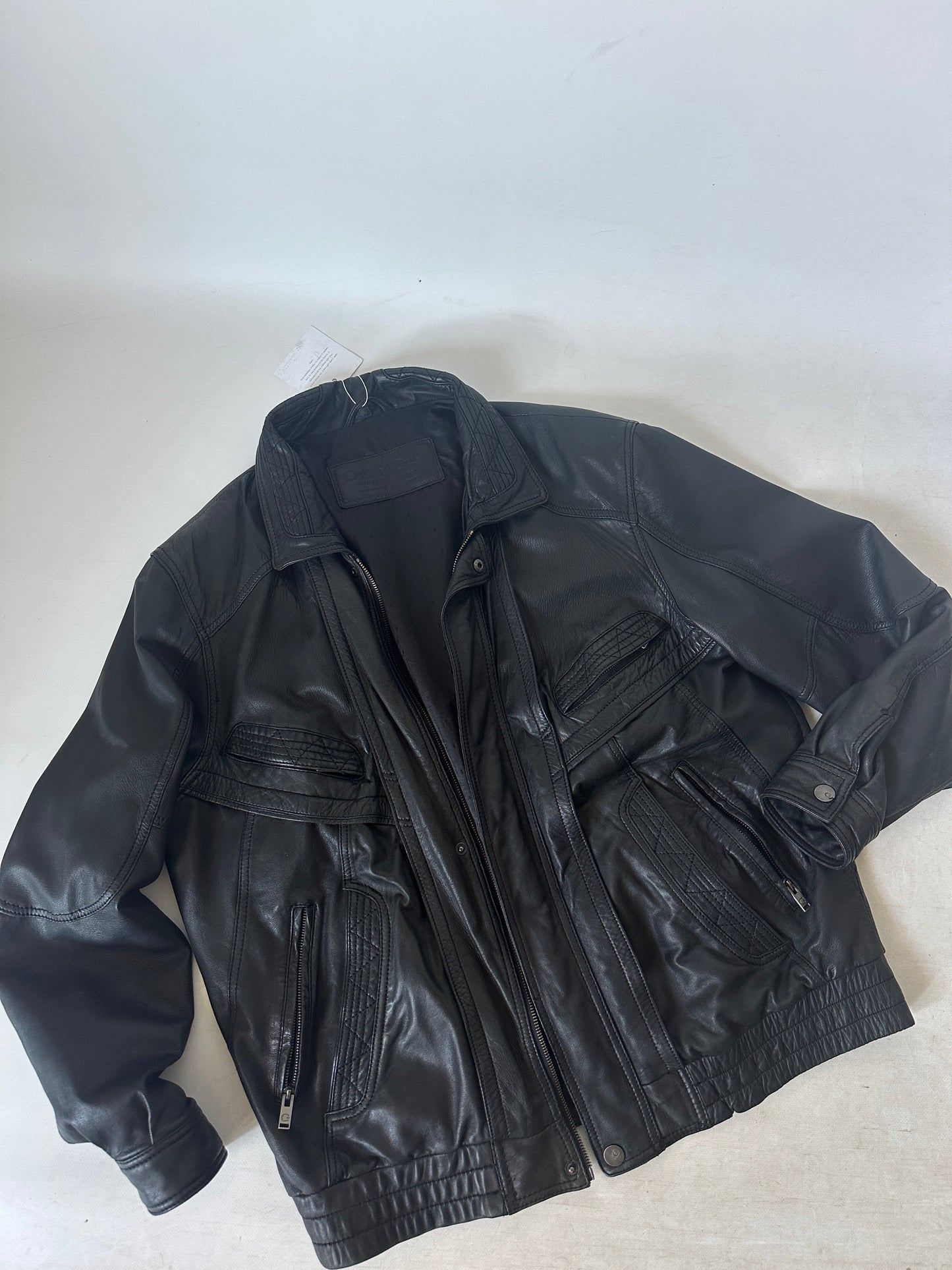 Genderless black leather bomber