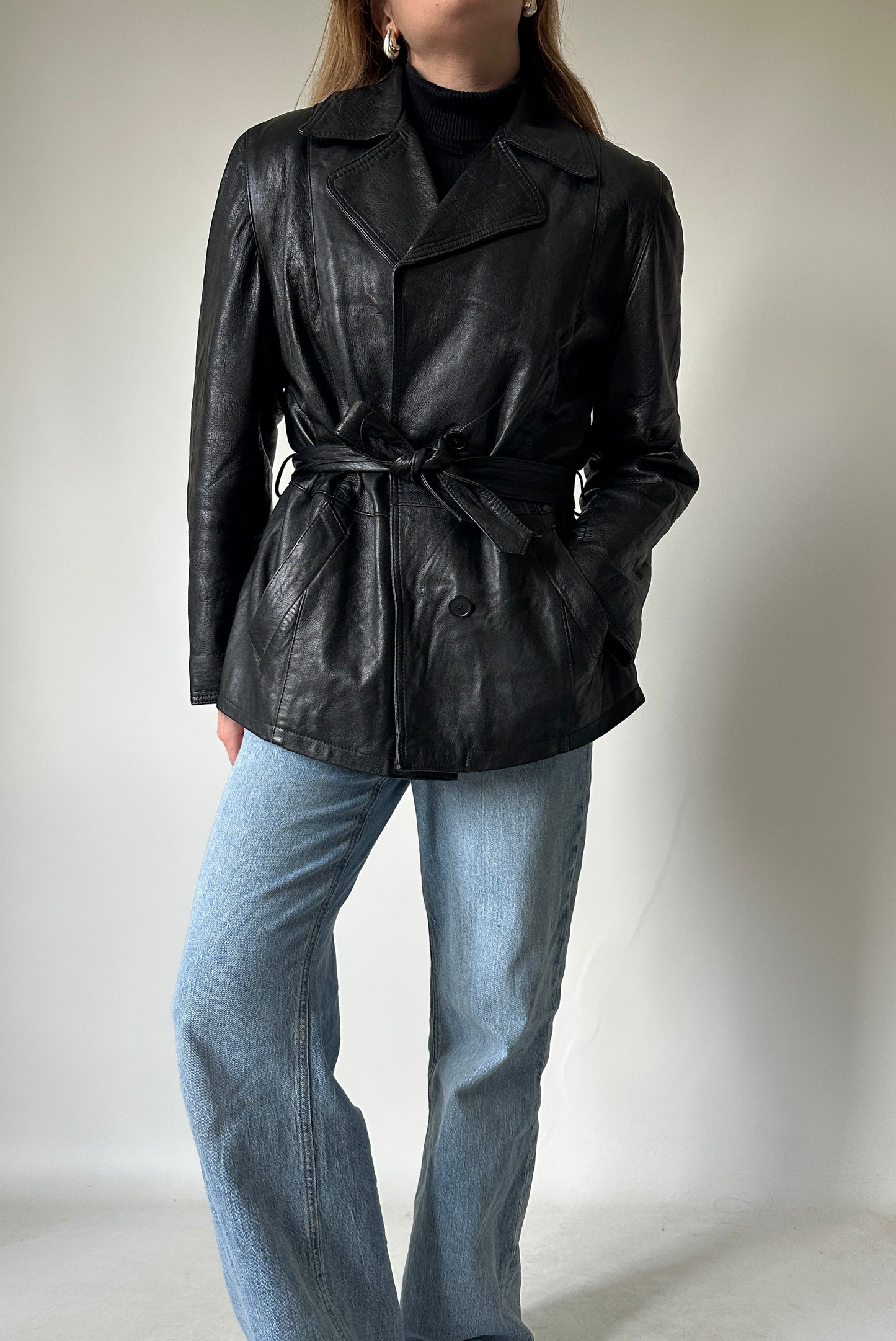 Chic leather jacket with belt