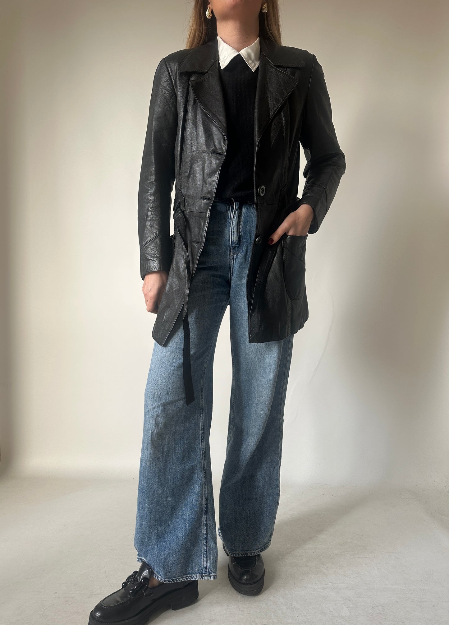 Black leather jacket with belt