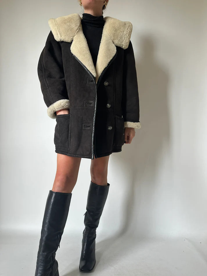 Shearling nero con cappuccio