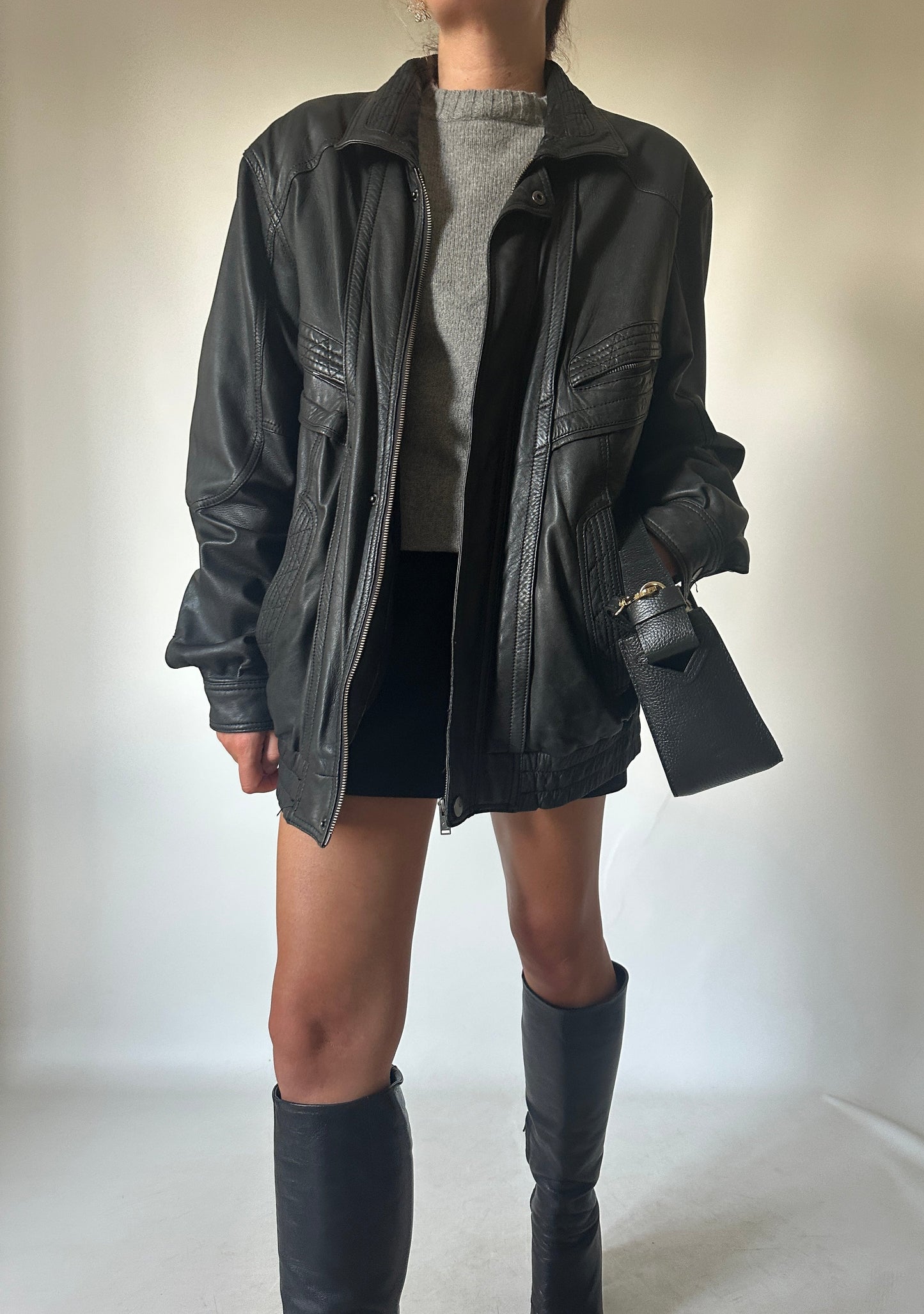 Genderless black leather bomber