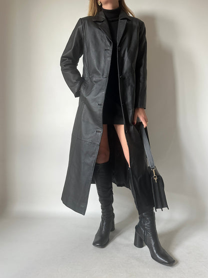 Iconic extra long black leather trench
