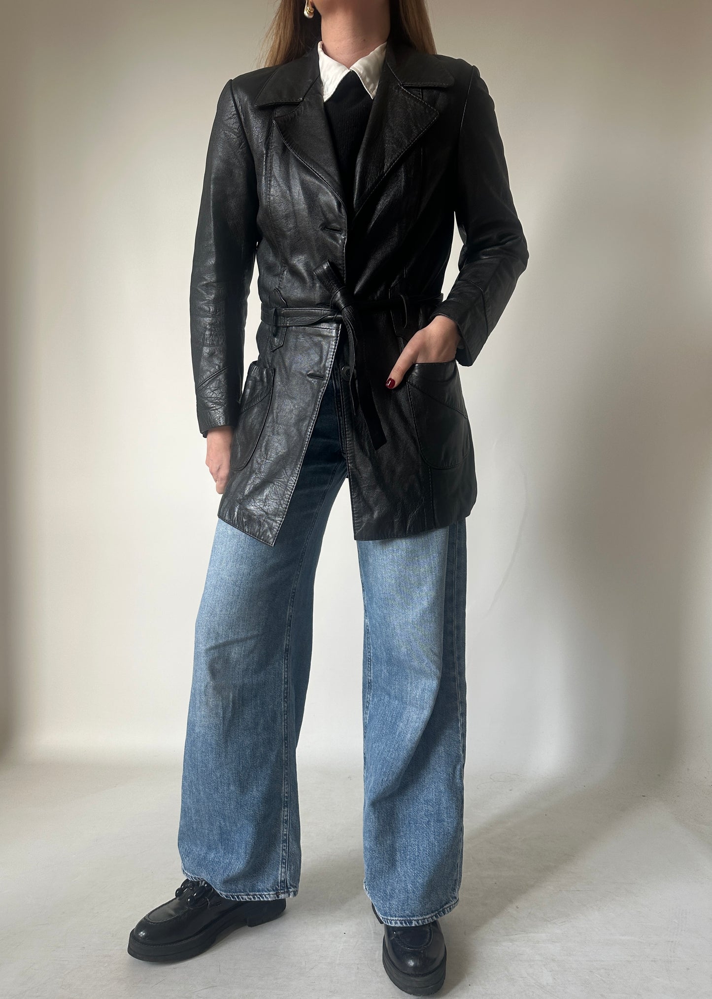 Black leather jacket with belt