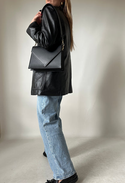 Minimal black leather jacket